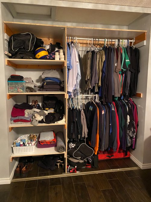large closet shelves and double hanging space