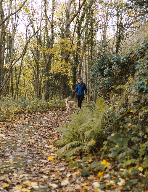 Woman-walking-dog