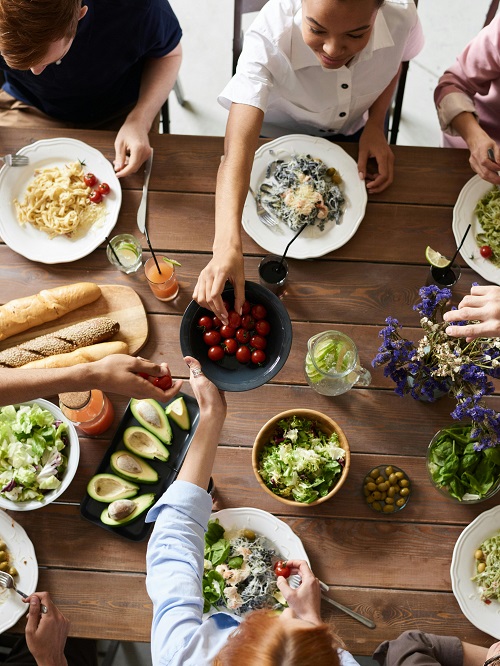 family around the table sharing a meal