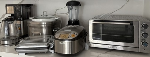 various small appliances on the kitchen counter