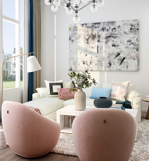 bright living room with white couch, 2 pale pink chairs and modern light fixtures and painting